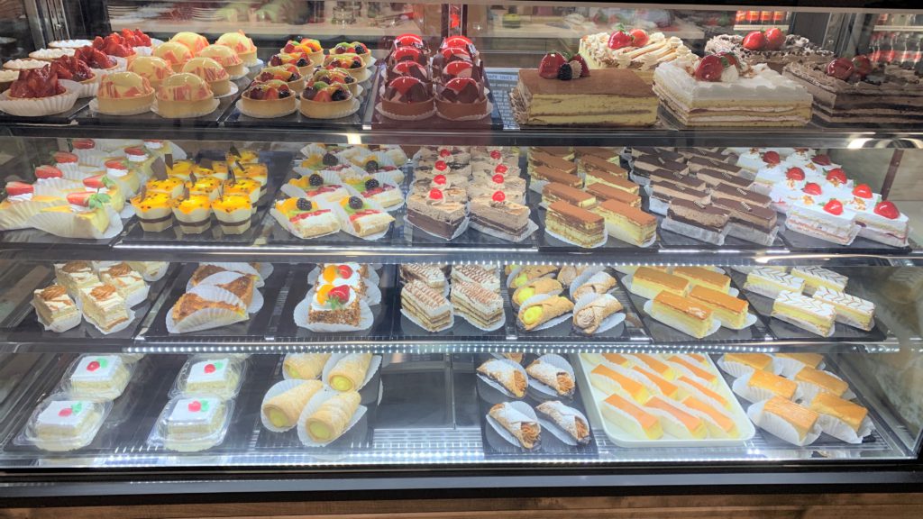 Assorted dessert display in Mecatos Cafe